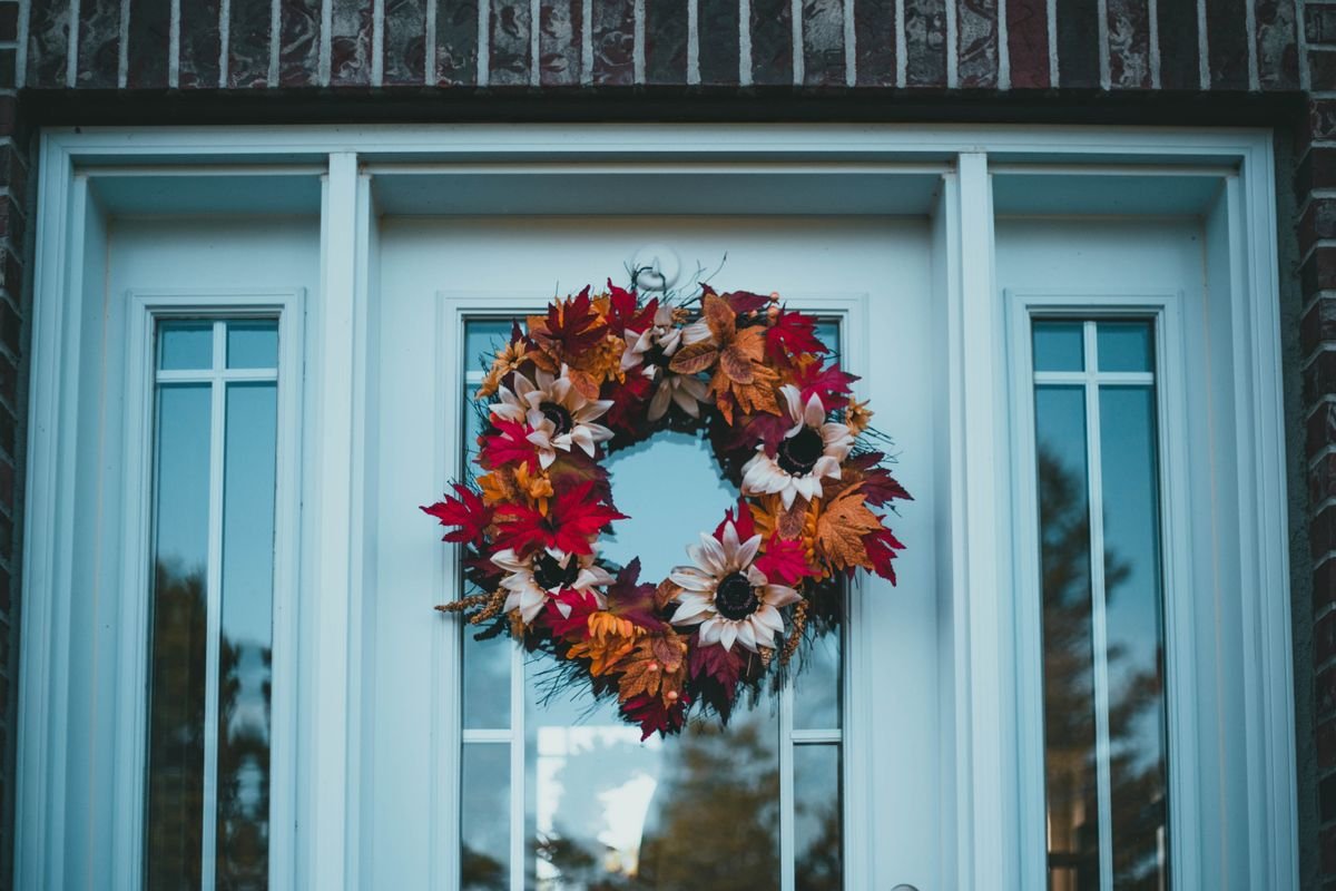 Cartoon crescent moon and star window clings in a cute halloween window display