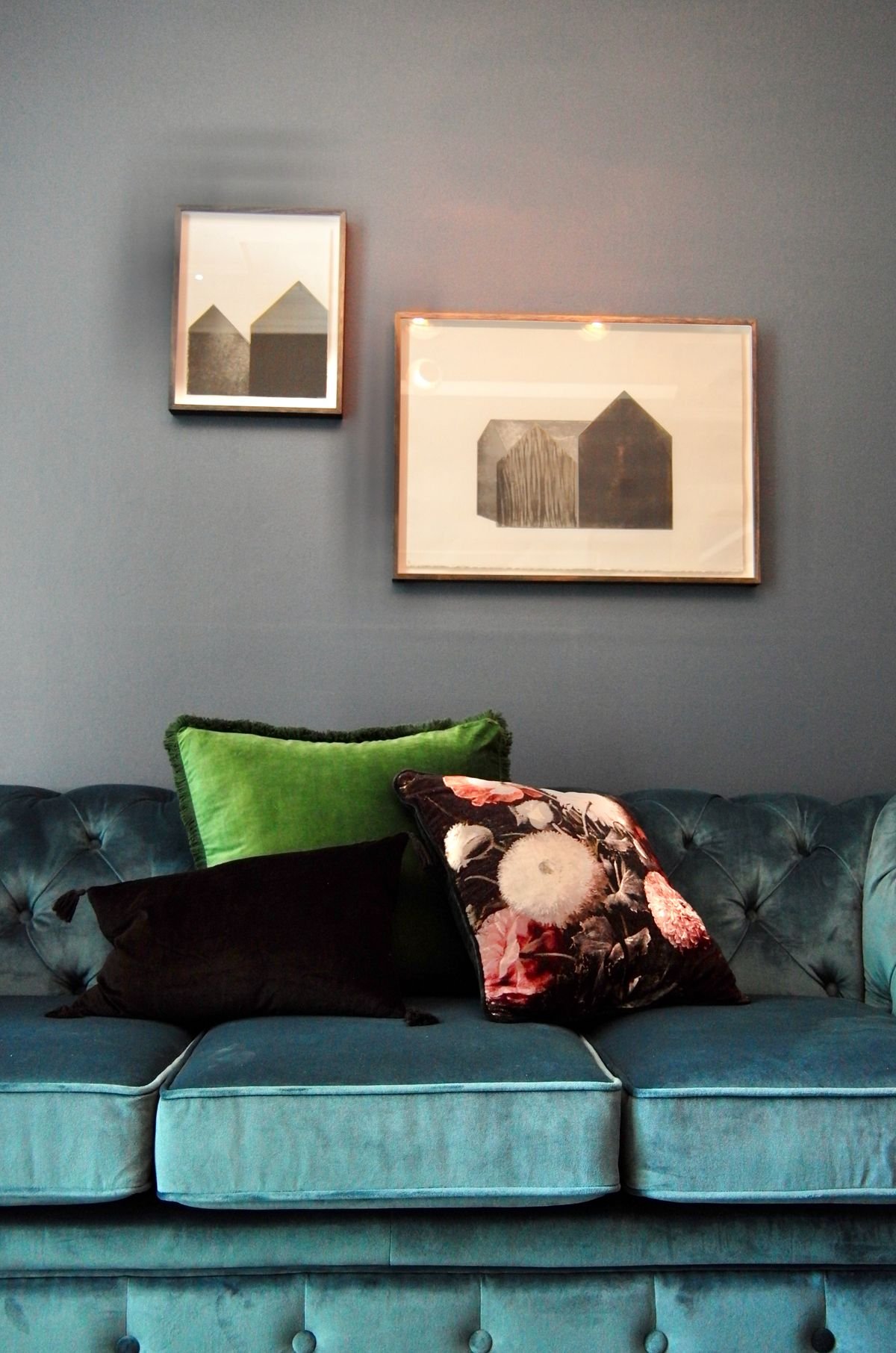 Dark velvet throw pillows on a sofa for Halloween