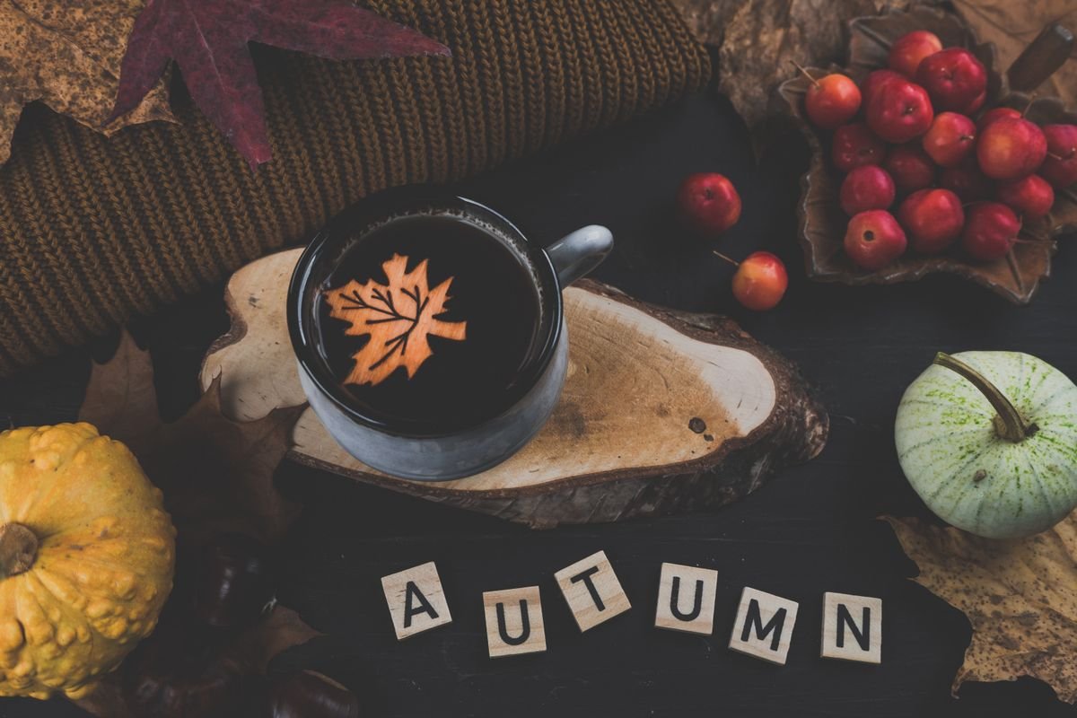 Coffee table tray with dried leaves white gourds and halloween accents
