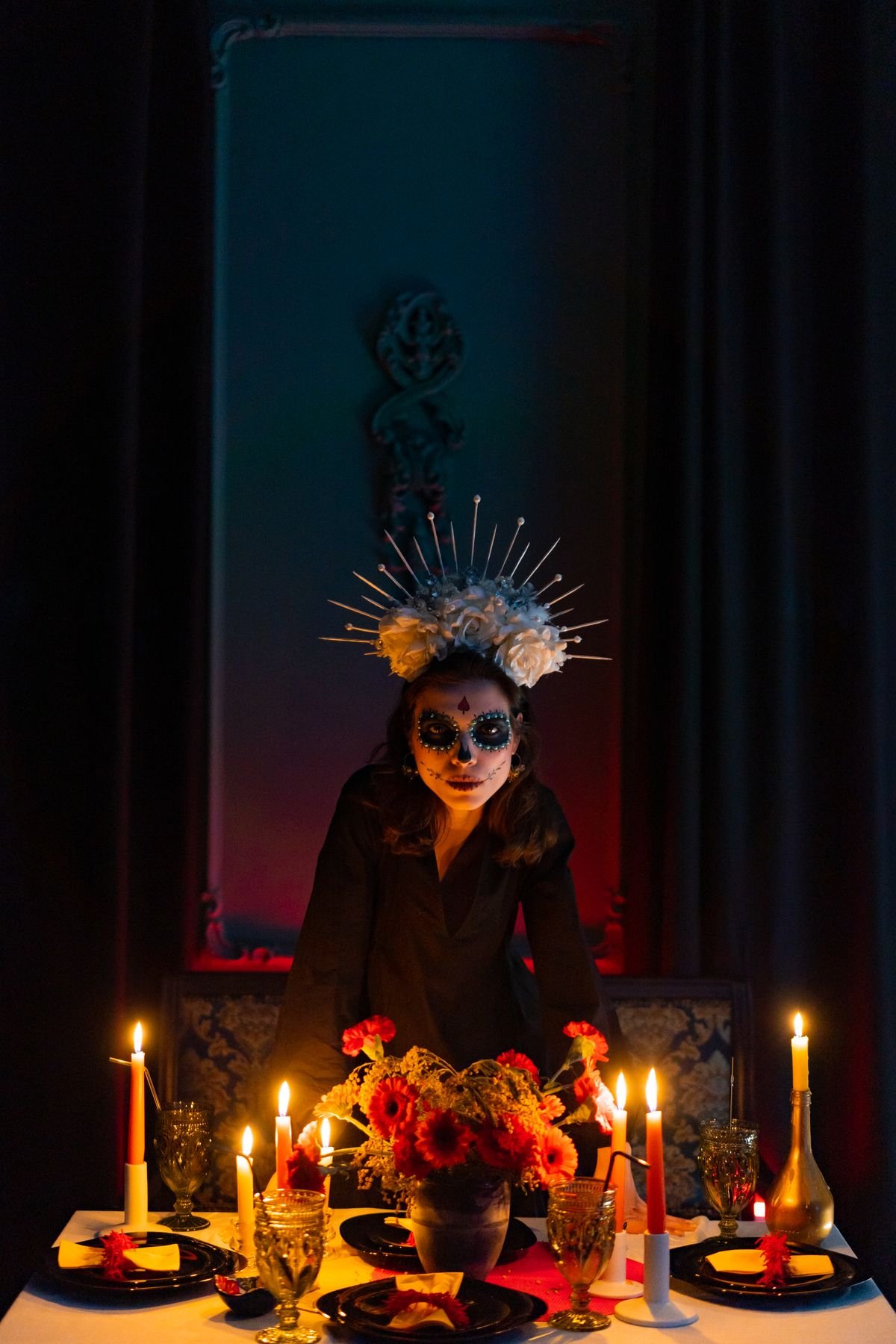 Black and orange halloween party decor in a cosy living room