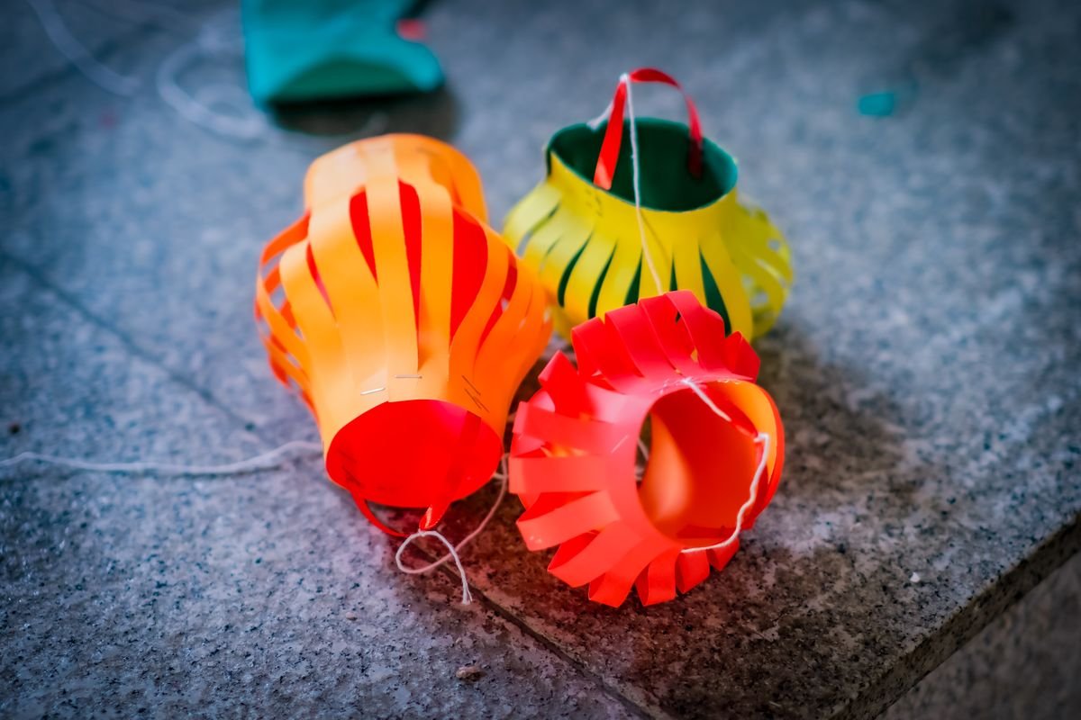 Crepe paper tassel garland in orange, black and purple