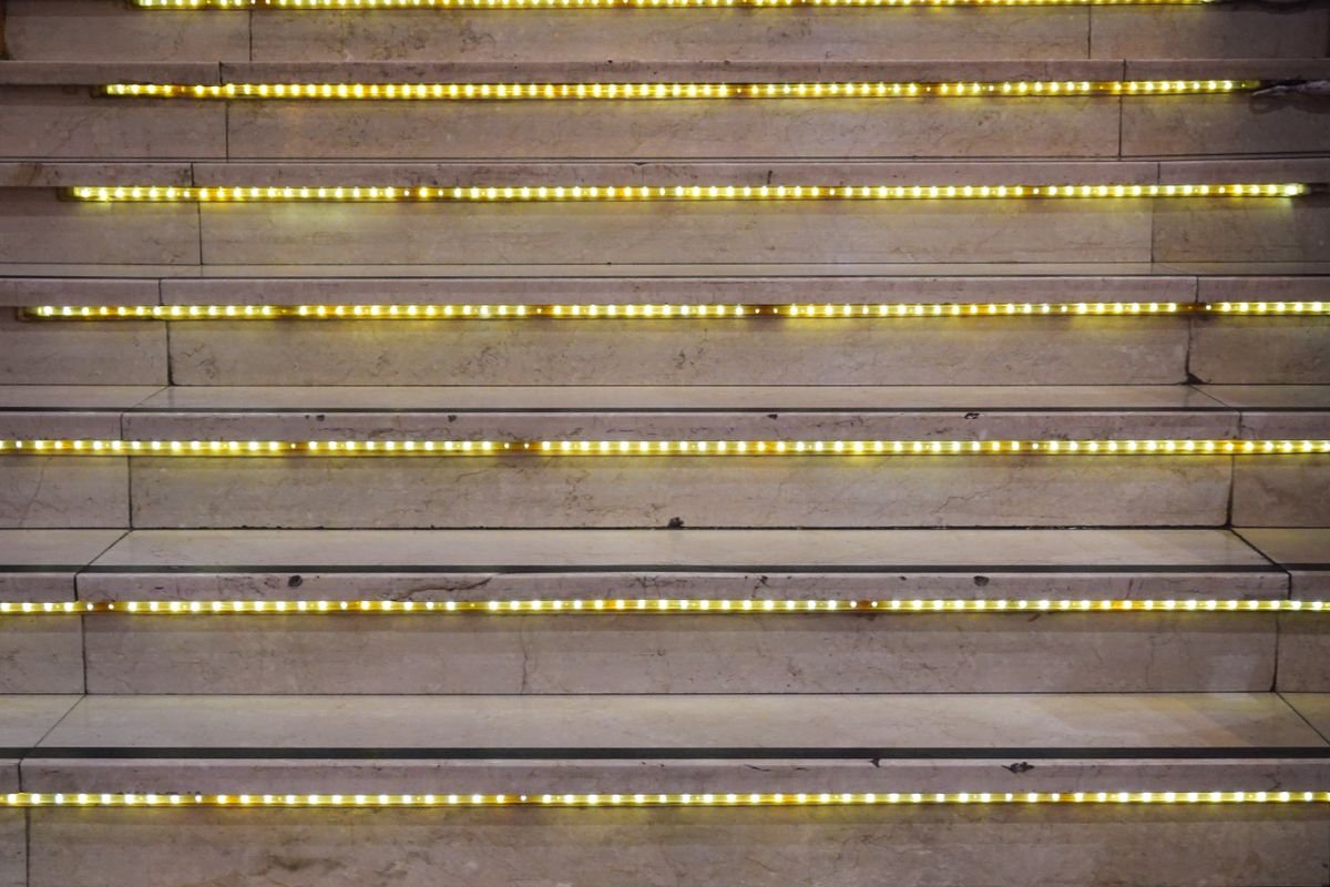 Fairy lights wound along a staircase banister